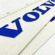 Chlapacz na błotnik z niebieskim napisem &bdquo;VOLVO&rdquo; biały (600&times;180)