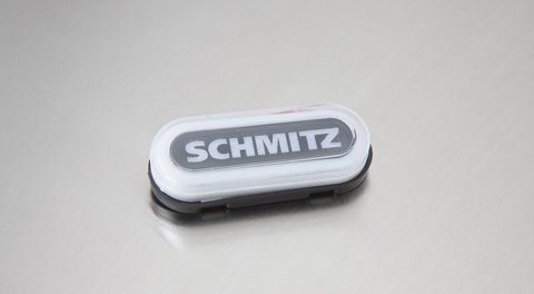 Ponadgabarytowa lampa owalna NEON z napisem &bdquo;SCHMITZ&rdquo; w kolorze białym