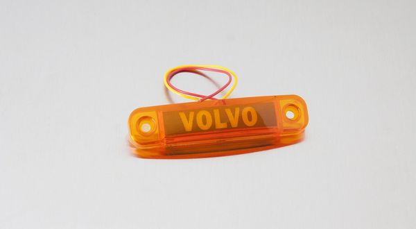Ліхтар габаритний уздовж напис "VOLVO" LED жовтий MG100932 фото