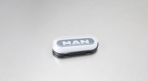 Ponadgabarytowa lampa owalna NEON z napisem &bdquo;MAN&rdquo; w kolorze białym