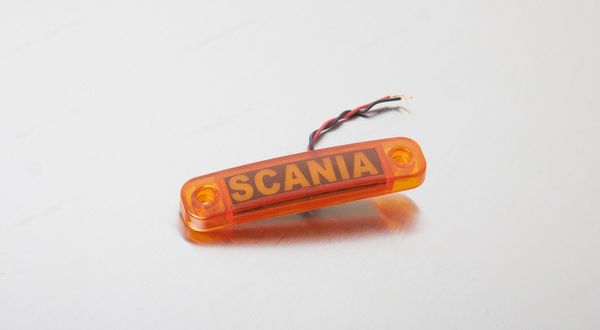 Ліхтар габаритний уздовж напис "SCANIA" LED жовтий MG100793 фото